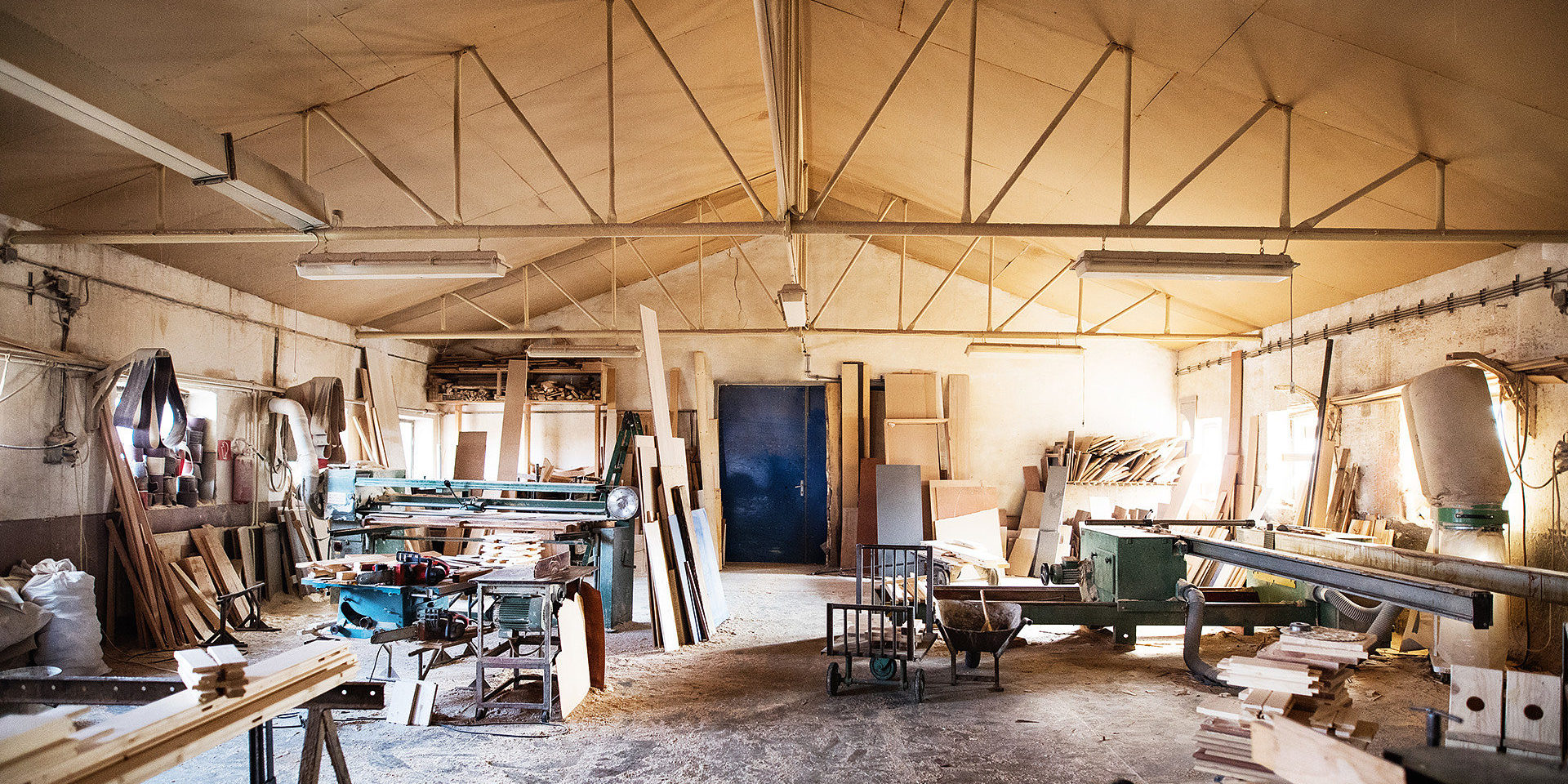 An interior of a big carpentry workshop.